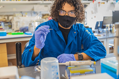 A student in a lab.