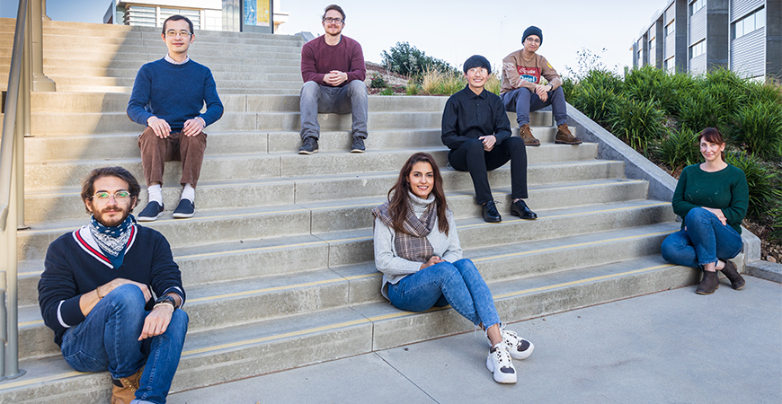 Chemistry Professor Tao Ye and his students gathered on campus.